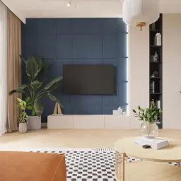 Nowoczesny salon z niebieską ścianą, telewizorem, roślinami i drewnianymi meblami.