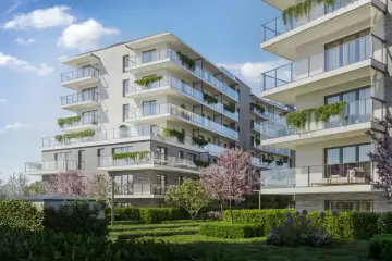 Nowoczesne apartamentowce z balkonami i zielenią, w otoczeniu ogrodu.